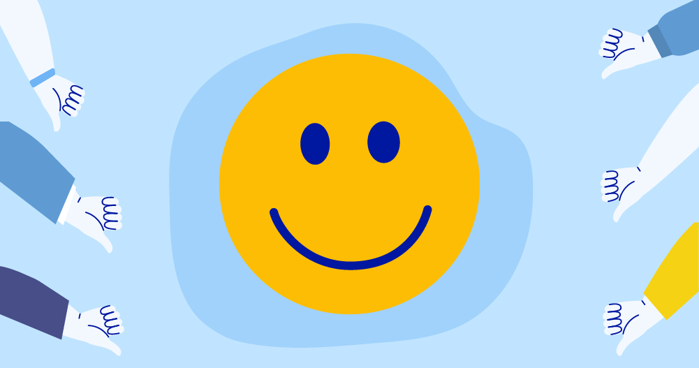 Ilustración del emoticono sonriente del smiley rodeado de manos haciendo el gesto de pulgar abajo para mostrar cómo dejar de ser envidioso.