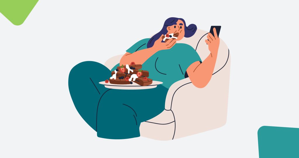 Ilustración de una mujer sentada en el sofá con una bandeja llena de dulces encima, para hablar del hambre emocional