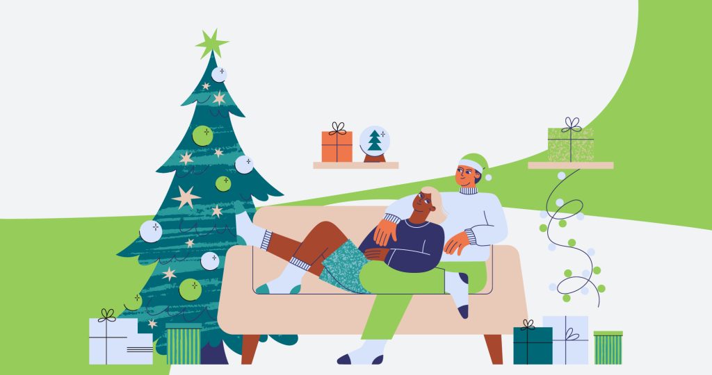 Ilustración de una pareja sentada en el sofá junto al árbol de Navidad, para hablar de Navidad en familia.