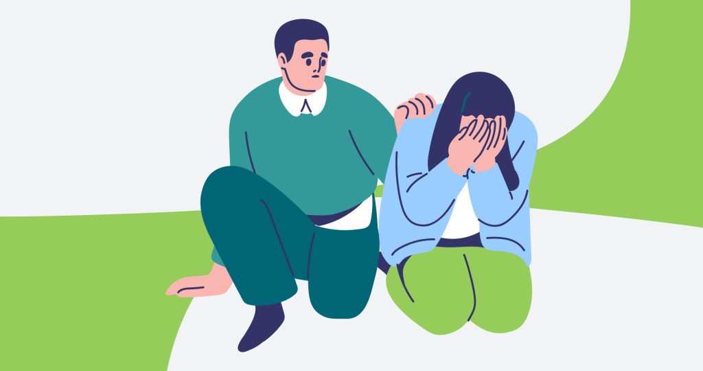 Ilustración de una pareja de jóvenes, arrodillados, la mujer se tapa la cara con las manos y el hombre intenta consolarla, para hablar de cómo superar un duelo.